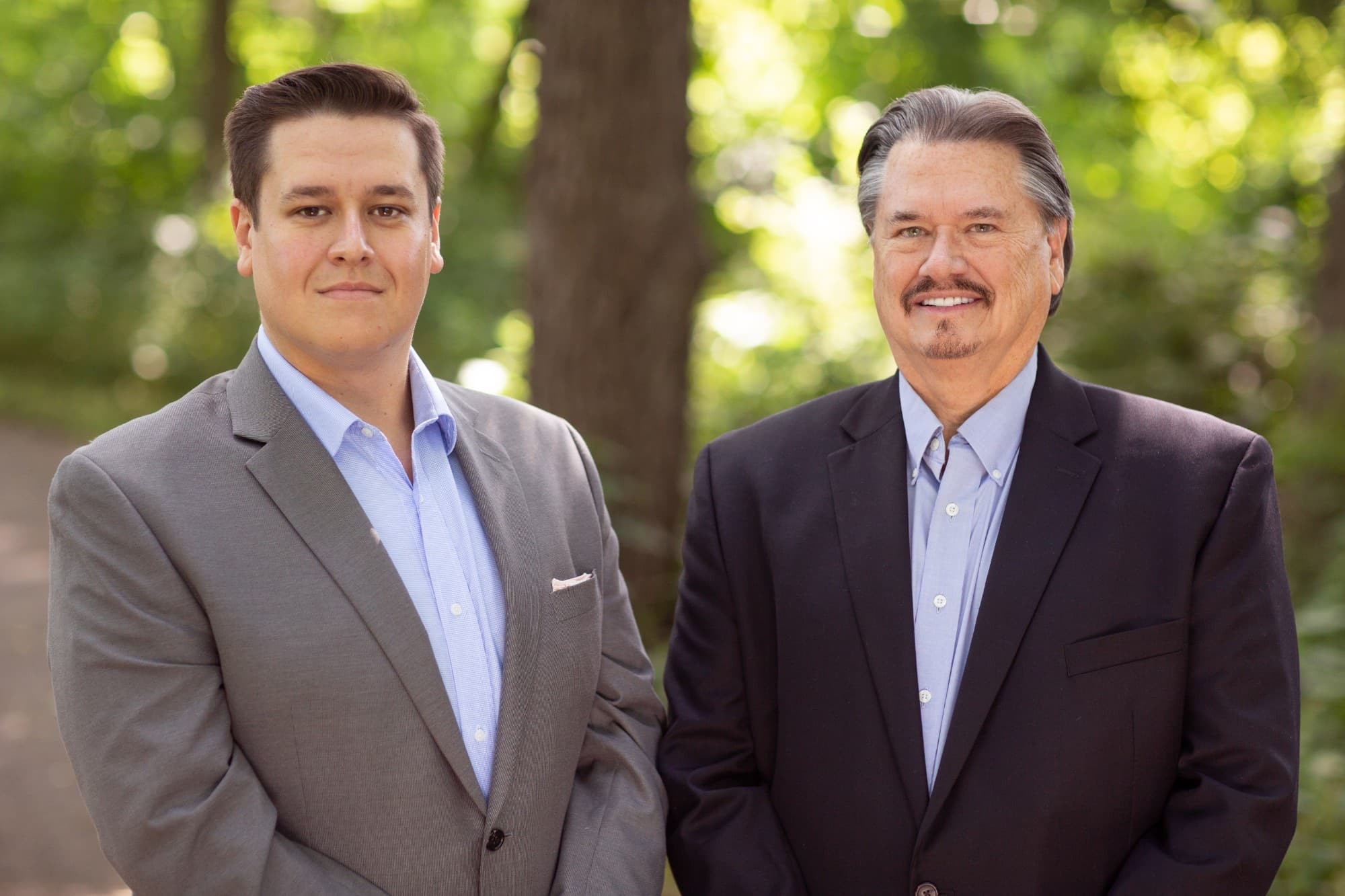 Cam and Dave Eslinger standing together outdoors
